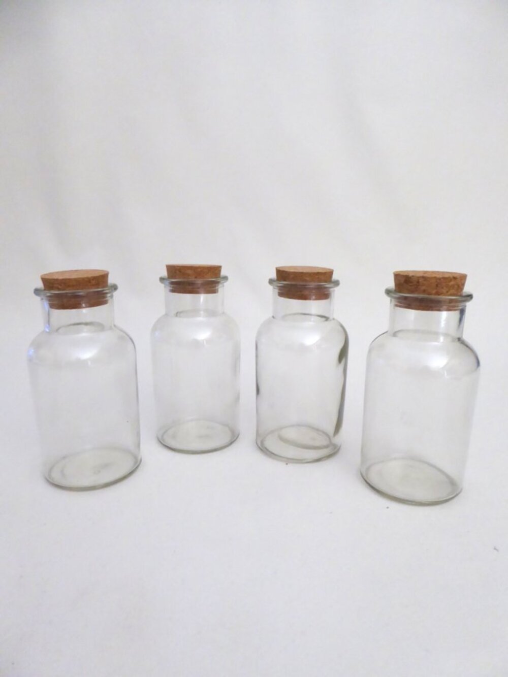 NEW 5” GLASS CORK TOPPED JARS KITCHEN CRAFT STORAGE JARS (LOT OF 4)